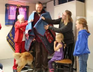 Quilts of Valor presents Corporal Jonathan Healzer with quilt #296,669 from the organization - 1 of the 92 that Rita Moore has made (or still in progress) for the organization.