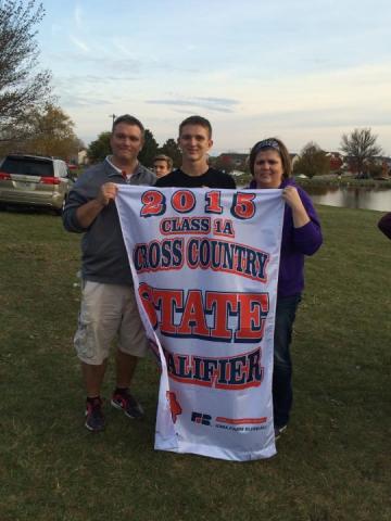 Jordan Yessak with his parents, Jason and Anita.