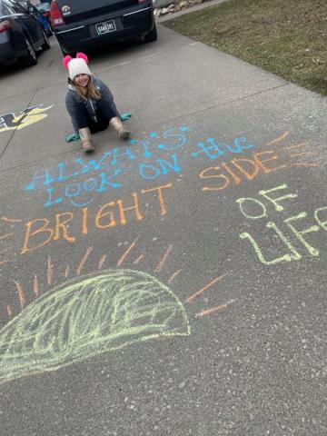 Kenidi Root brought smiles to others on her birthday while out on a run and bringing along her chalk