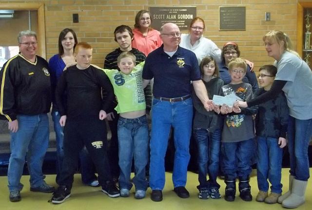 The K of C donated to the local Special Olympics team after their Tootsie Roll fund-raiser.