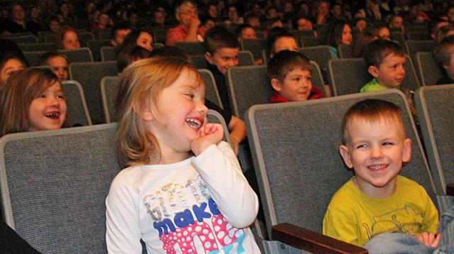 Elementary students laugh during an opera performance of '3 Billy Goats Gruff' on Tuesday.