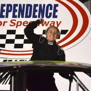 Leah Wroten celebrates her first feature win on July 2, 2013, in Independence.