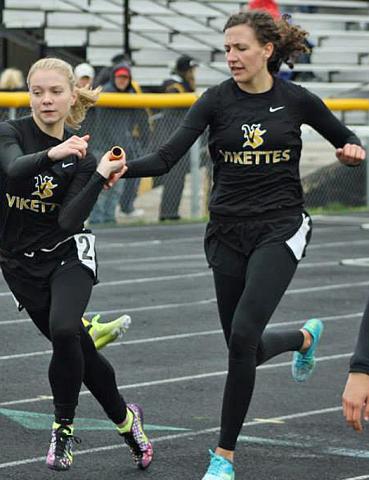 Lily Horst (right) helps VS relay teams to victory and has set new school record in 3000M run.