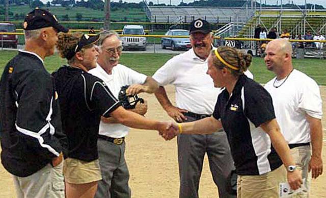 Liz (left) and Sarah Hill shake hands before Game 2 of V-S/ CPU game in Center Point.