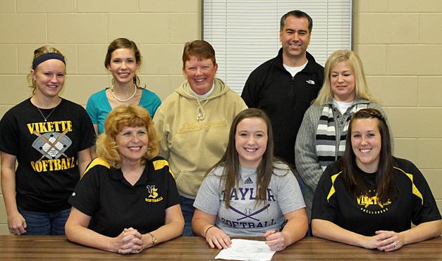 Teammates Devon Ankney and Katie Hanson also joined the signing ceremony.