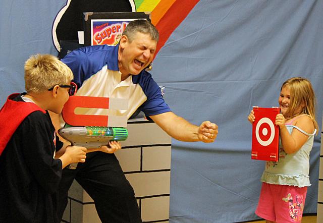 Mr. E involved area children in his comedy and magic show Thursday.