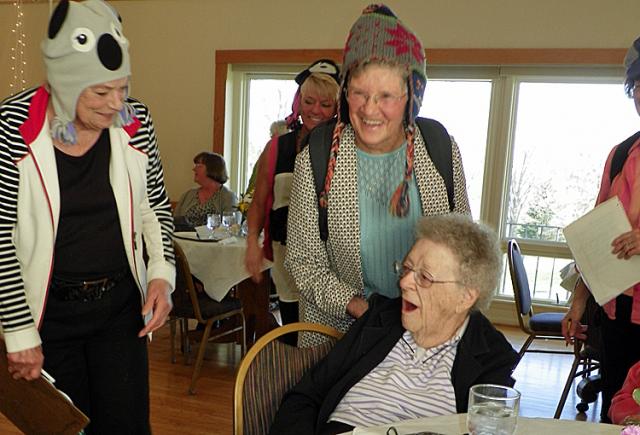 Marjorie Rouse reacts to being named the Vinton Women's Club 2014 Woman of the Year.