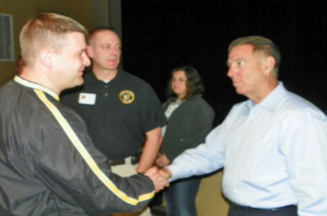 VSHS Asst. Principal Ryan Davis greets Col. Danny McKnight after his speech.