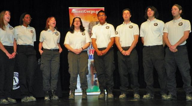 The AmeriChoir sings the National Anthem at the start of the Class XVI A graduation.