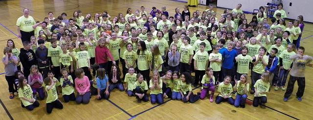 Flash mob participants posed for photos after practicing Thursday morning at Tilford.