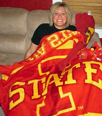 Monica Huelman Zaruba with her favorite team blanket.