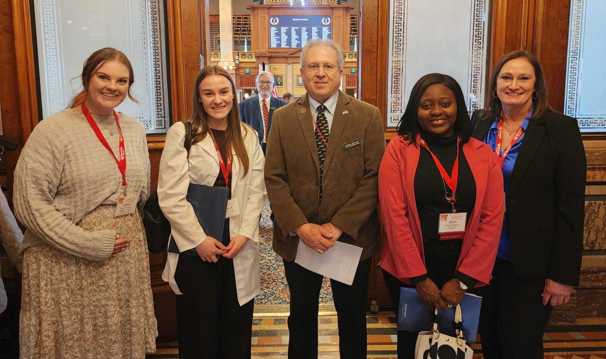 Iowa pharmacy student Natalie Boyer of Vinton (2nd from left), with other Iowa Pharmacy Association members, advocates issues to help patients and pharmacies on Feb. 25th.. Click to read article