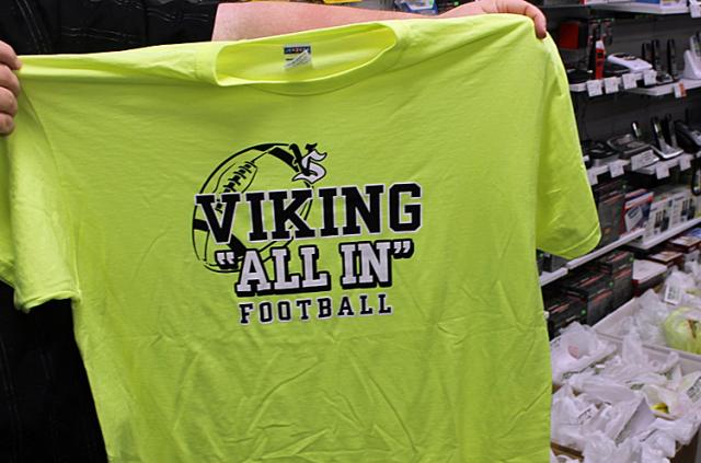 Neon green shirts are available at LaGrange Pharmacy for tonight's Neon Night with the Vikings.