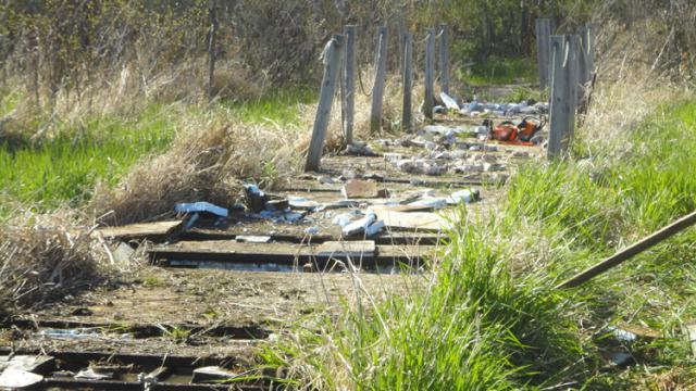 The old boardwalk during the removal process that Oak 2 conducted.