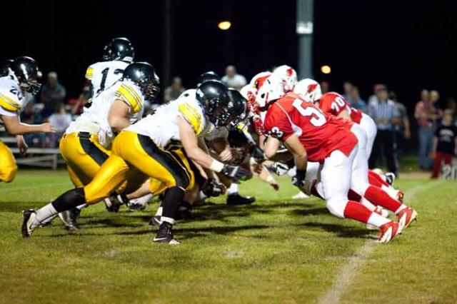 The Viking offensive line faced a large defensive front for Maquoketa.