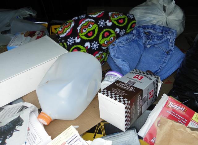 Clothing, including Oscar the Grouch Christmas PJs, was placed in a Vinton recycling bin recently.