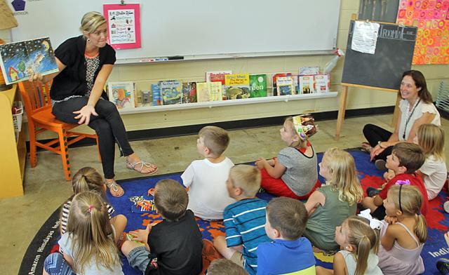 'There's no stopping Art when Art is inspired:' Mrs. Otto reads her favorite book to K students.