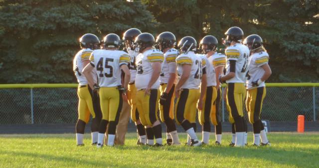 The Vikings huddle during their game at Benton.