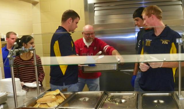 Kiwanis members cooked for the FFA pancake breakfast Saturday at VSHS.