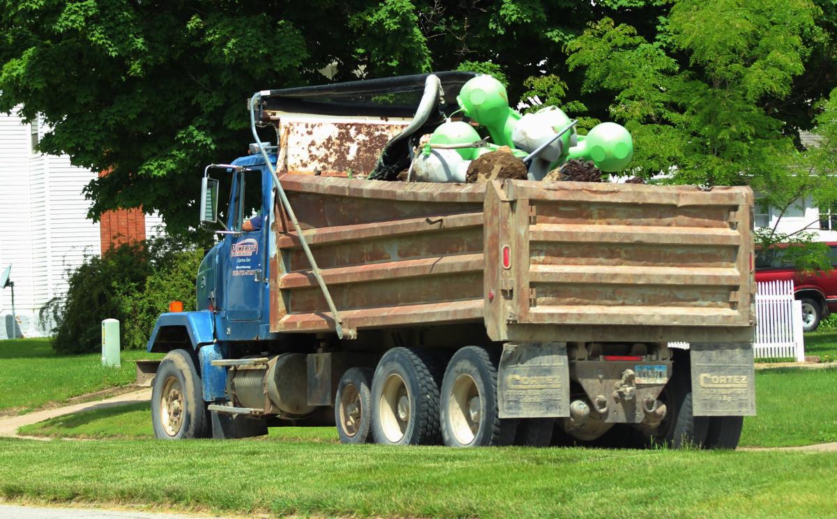 The playground equipment makes its way through Vinton after removal from Riverside Park