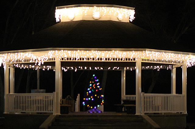 Lights and a tree adorn the gazebo at Celebration Park.