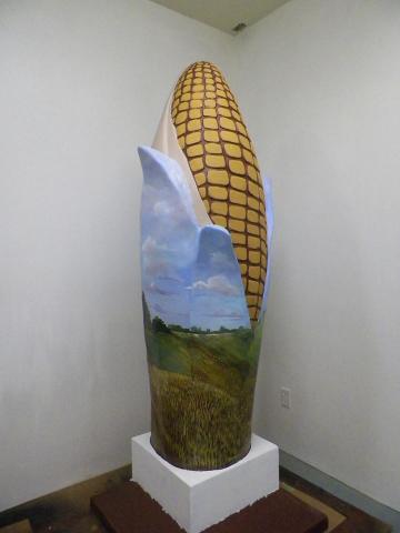 This ear of corn statue painted by Brian Parr will be among 10 offered by silent auction.
