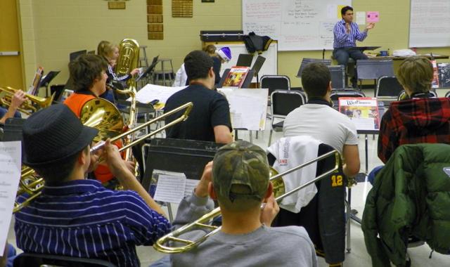 While their parents helped with the Soup Supper, VSHS pep band members rehearse before the game.