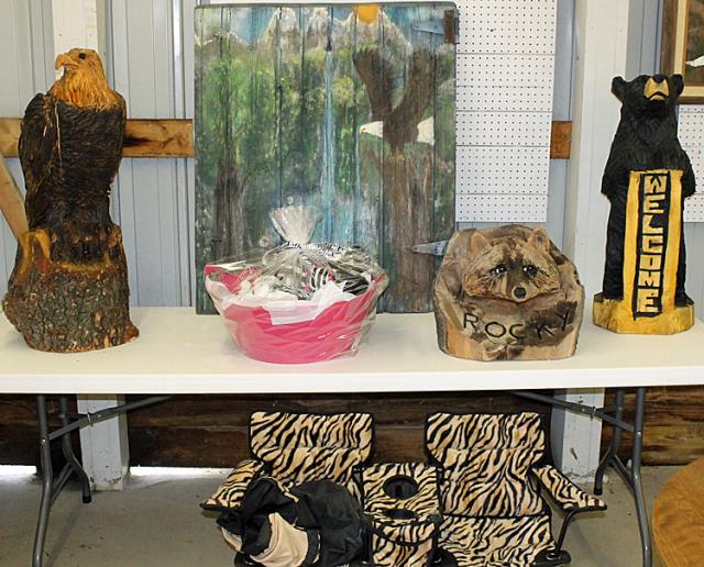 These are some of the live auction items for the Pray PHor a Cure event this Saturday.