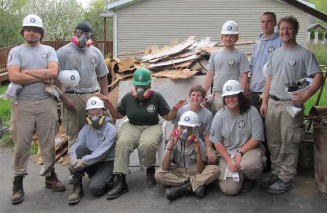 The team after removing a level of flooring
