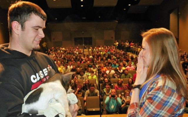 Ms. Sudtelgte reacts after kissing the pig last Friday during the VSHS assembly.