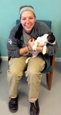 Pine 1 Member Shelby holding Sadie at The Shepherd of the Hills Humane Society Adoption Center.