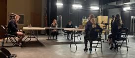 Tori Elwick, Grayce McClintock, Rayleigh Stander, Jerry Lee, Izzie Birker, Matthew Bookmeier, and Sam Lundvall presenting Conduct of Chapter Meetings on the Auditorium stage.