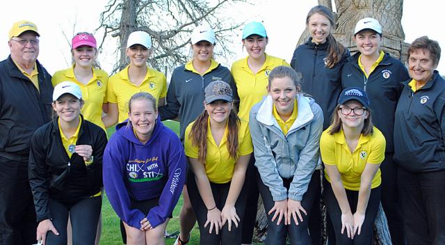 Vikettes celebrate with medalist Rachel Tandy; the team is now 15-0.