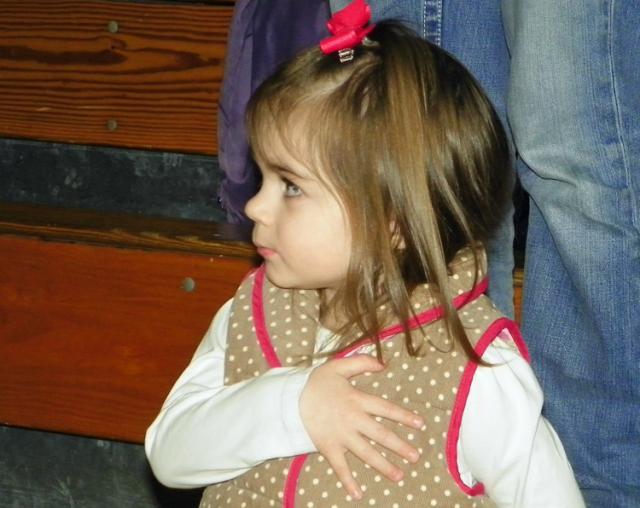 Raelynn, the daughter of VS cheerleading coach Krystal Fitzpatrick, loves the National Anthem.