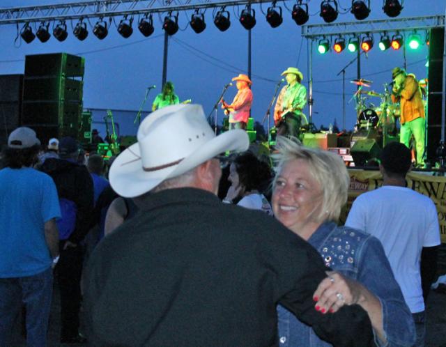 Tim and Sandra Rathe dance as the Bellamy Brothers sing Saturday.