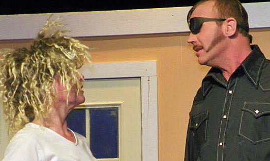 Rich Hainstock (shown rehearsing with Bonnie Beyer) says community theater is an 'addiction.'