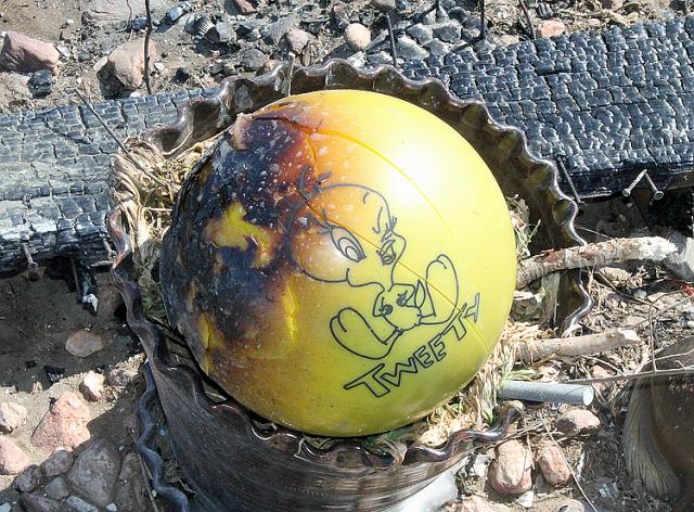 A charred child's ball was one of the few things not totally destroyed by a fire Tuesday.