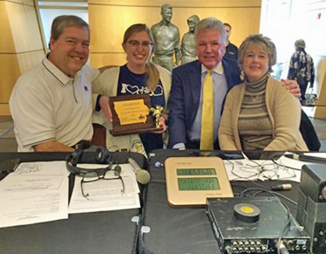 Jess Rundlett is celebrating her victory in the All Iowa Trivia Bee.