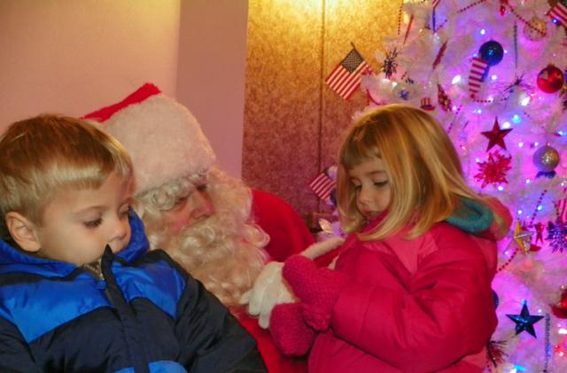 Jack and Madeline Blais speak to Santa Thursday.