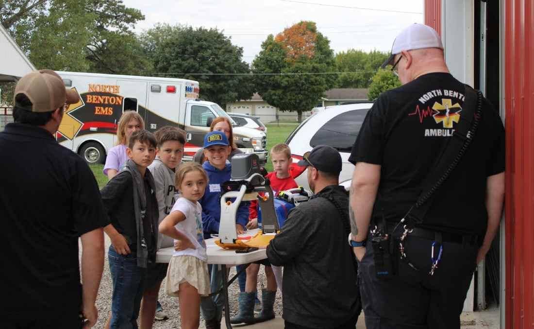 Kirsten Pettit, Jenna Grovert and the kids are learning about the tools found in an Ambulance. . Click to read article