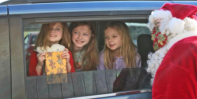 Breakfast with Santa brought children to see Santa outside in a drive through event