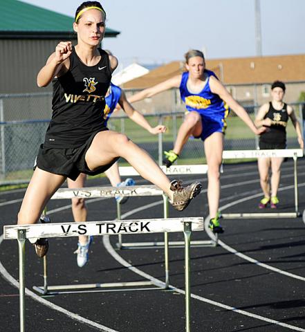Noelle Noe competes in the 400 hurdles event.