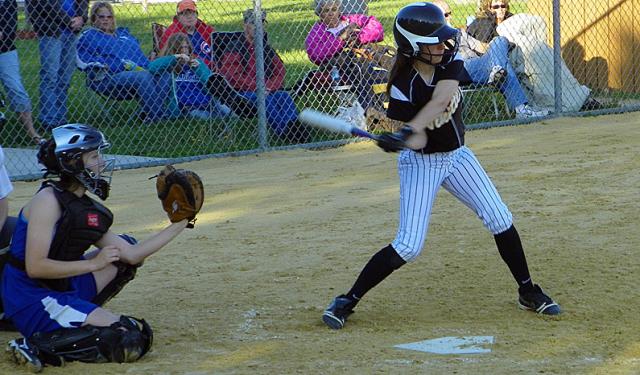 Mackenzie Stueck connects for a hit, driving in two runs against Anamosa.