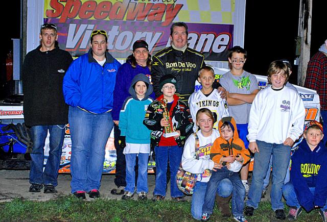 Scott Hogan and his family celebrate in Victory Lane after his Sept. 26 Modifieds Feature win.