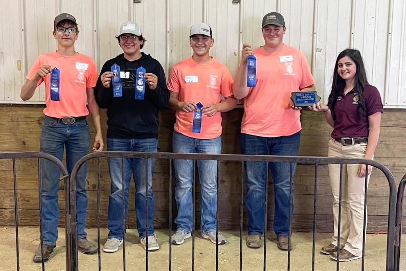 Austin Noe, Evan Lopata, Cooper McClintock, and Andrew Pingenot received 1st Place Team at District Livestock Judging at Kirkwood