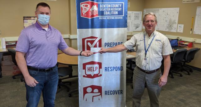 Benton Co.Republicans present check to Scott Hansen for Benton County Disaster Recovery Coalitian