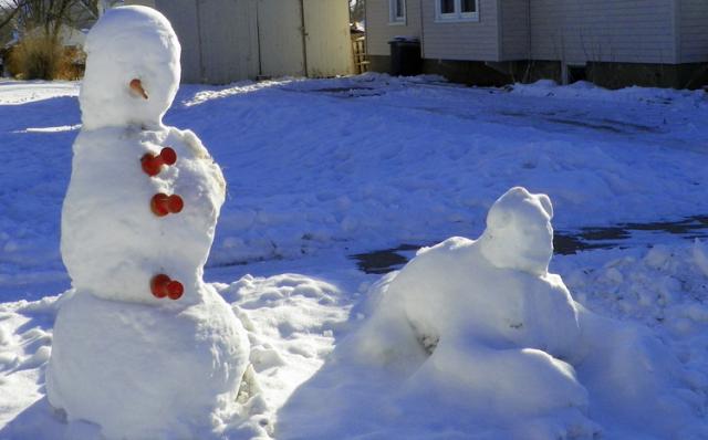 The snowman and his companion.