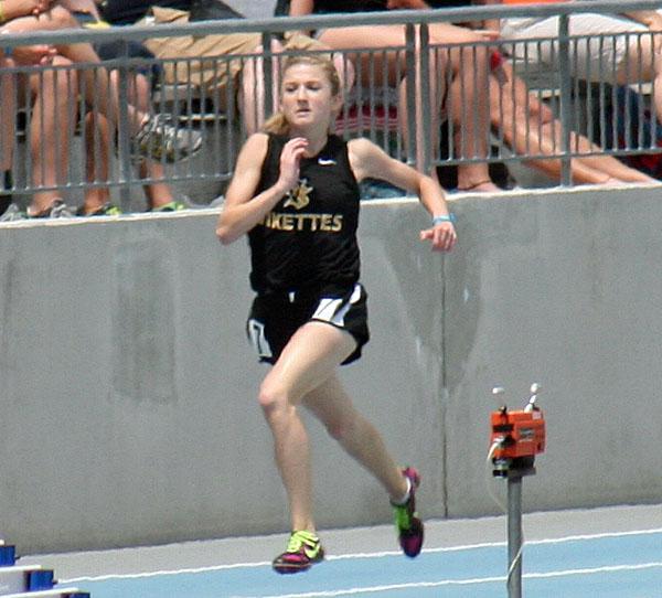 Payton Leonard runs the 400M at the State Track Meet.
