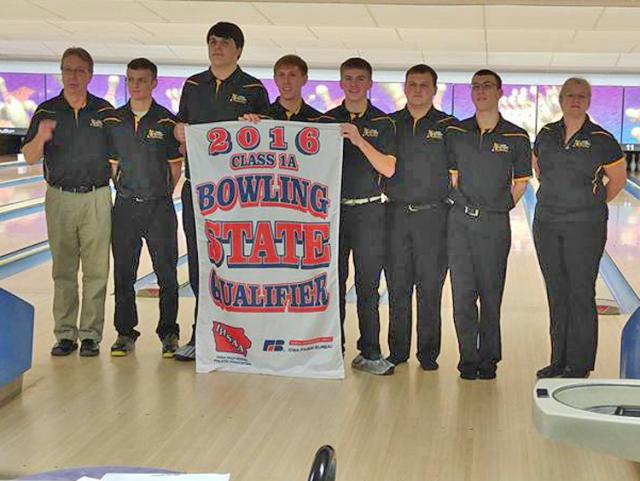 Viking bowlers with their coaches and their 2016 State banner.