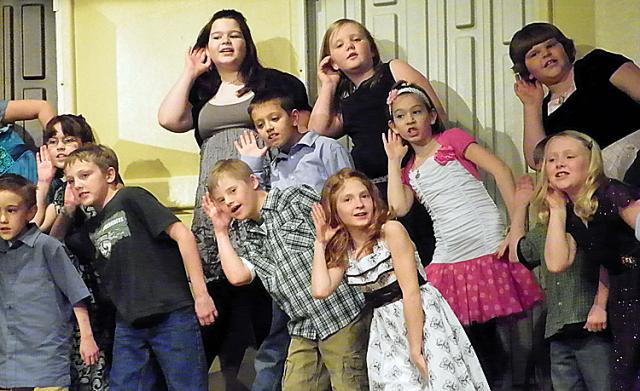 Third grade students performed patriotic favorites Tuesday evening.